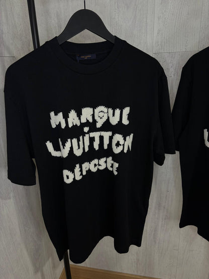 L CAMISETA