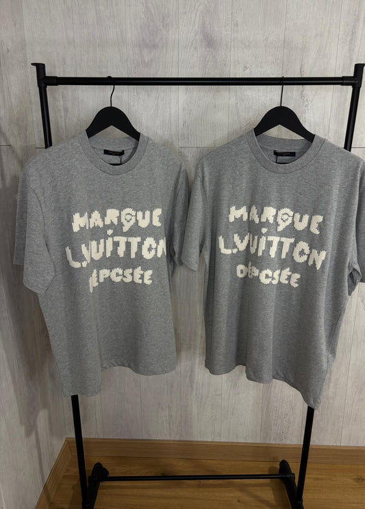 L CAMISETA
