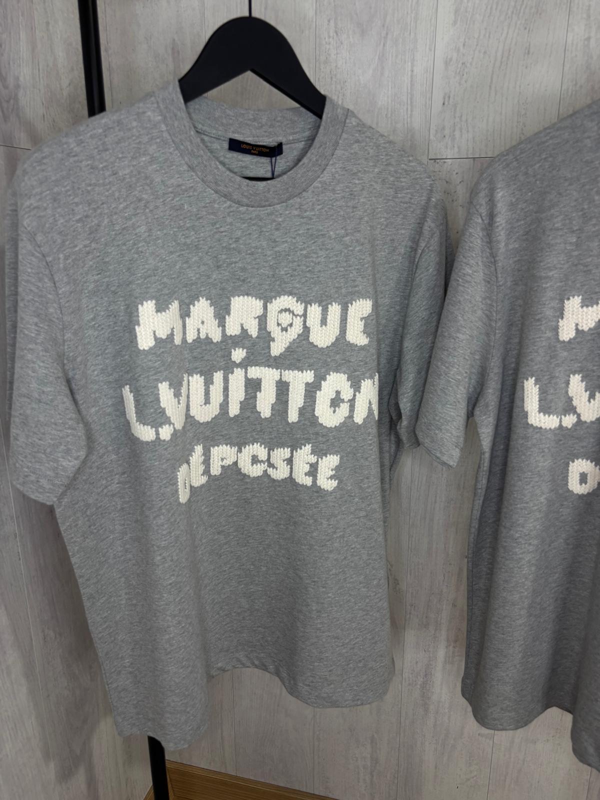 L CAMISETA