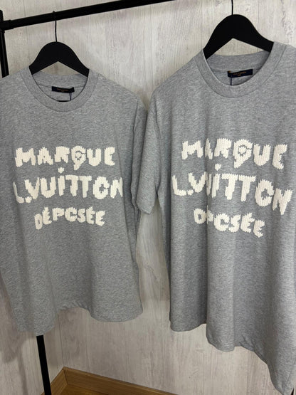 L CAMISETA
