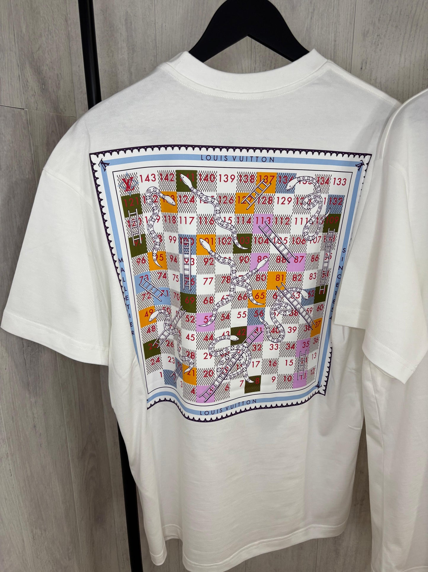 L CAMISETA
